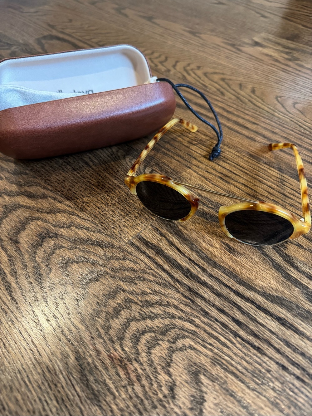 Illesteva Tortoiseshell Round Sunglasses with Dark Lenses